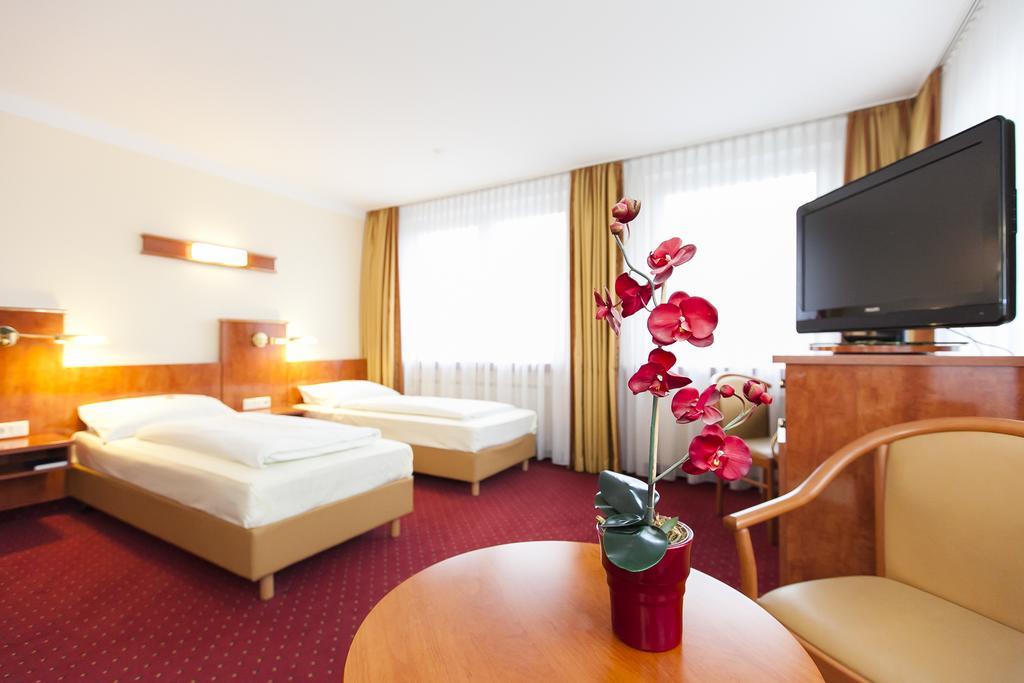 Hotel Am Berliner Platz Langenfeld  Pokoj fotografie
